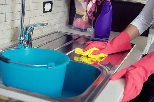 Office cleaning team maintaining desks and shared workspace in Pimlico